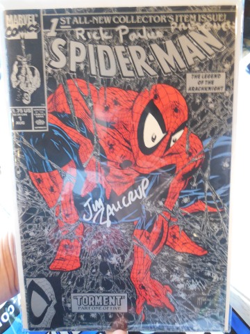 A signed copy of Spider-Man #1 from Rick. He drew pupils in Spidey's eyes.